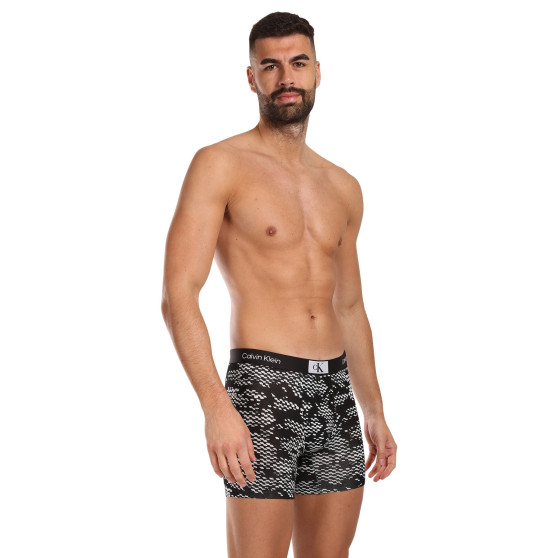 3PACK Boxers para homem Calvin Klein multicolorido (NB3529E-MRU)