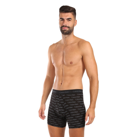 3PACK Boxers para homem Calvin Klein multicolorido (NB3057A-QYP)