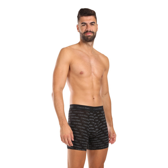 3PACK Boxers para homem Calvin Klein multicolorido (NB3057A-QYP)